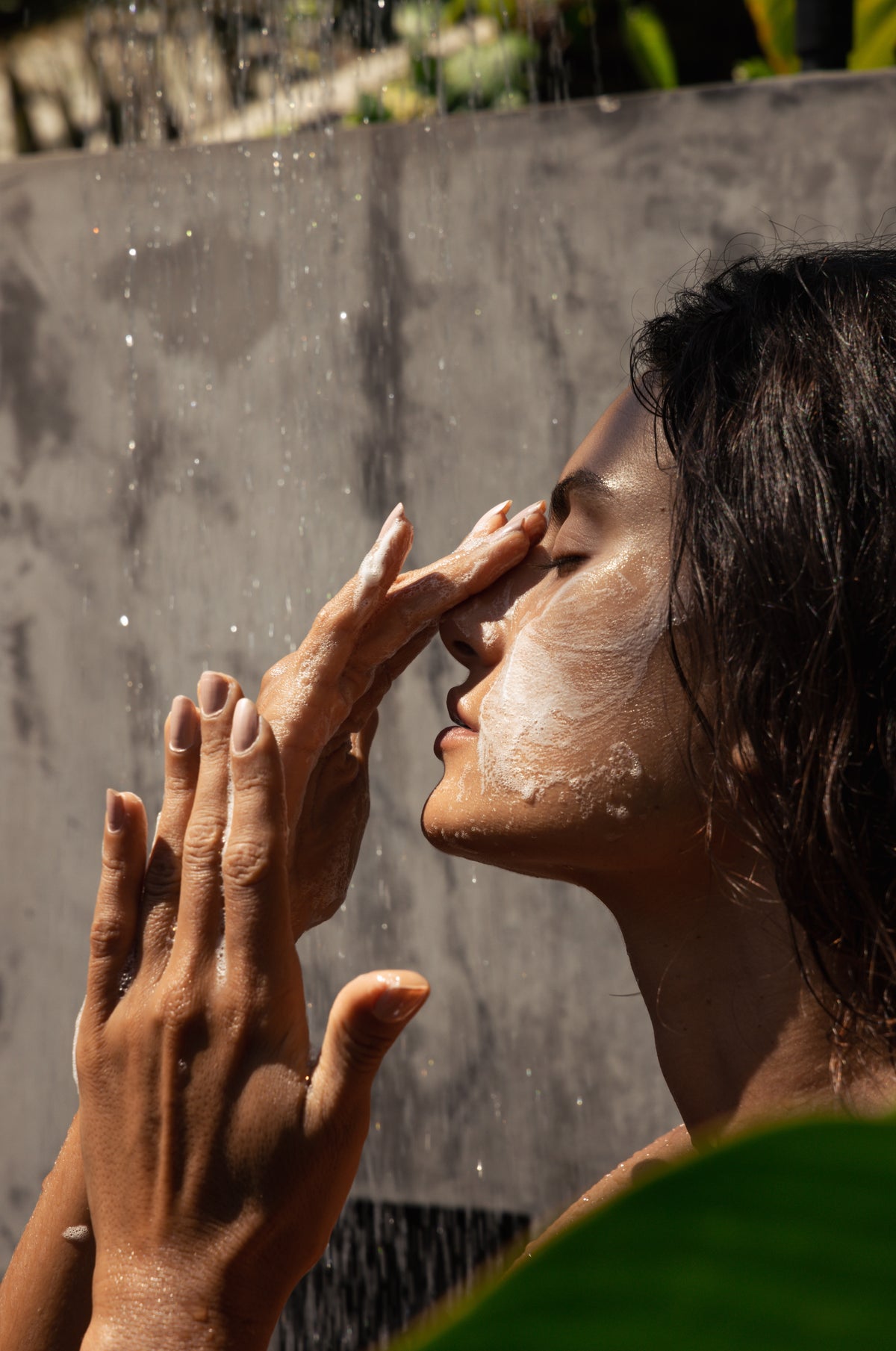 Refresh Face Wash poured into a wet palm under running water